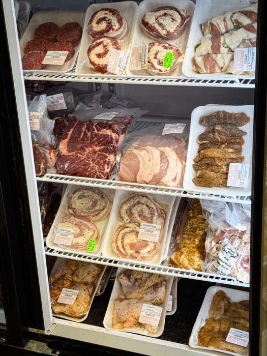 Marinated pinwheels in the display case at The Meat Hook